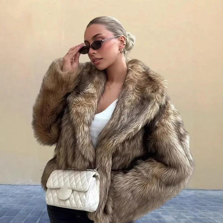 Woman in faux fur coat with sunglasses and white quilted bag, Rovelli fashion