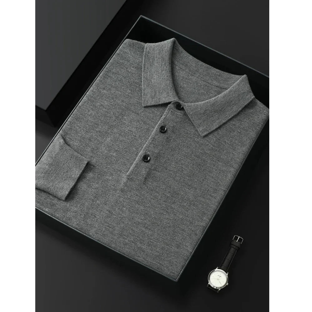 Folded gray Rovelli polo shirt in a box beside a black leather strap watch