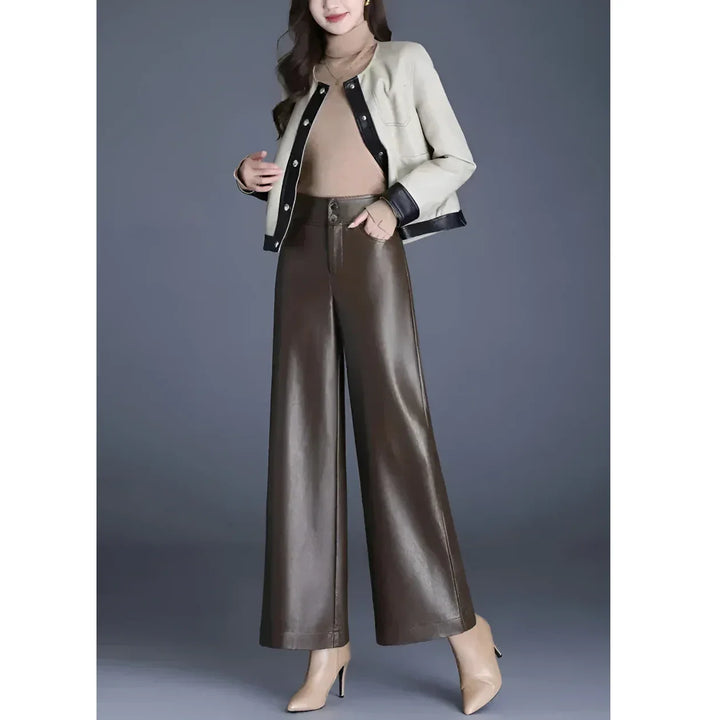 Rovelli wide-leg brown leather pants styled with beige jacket and nude heels