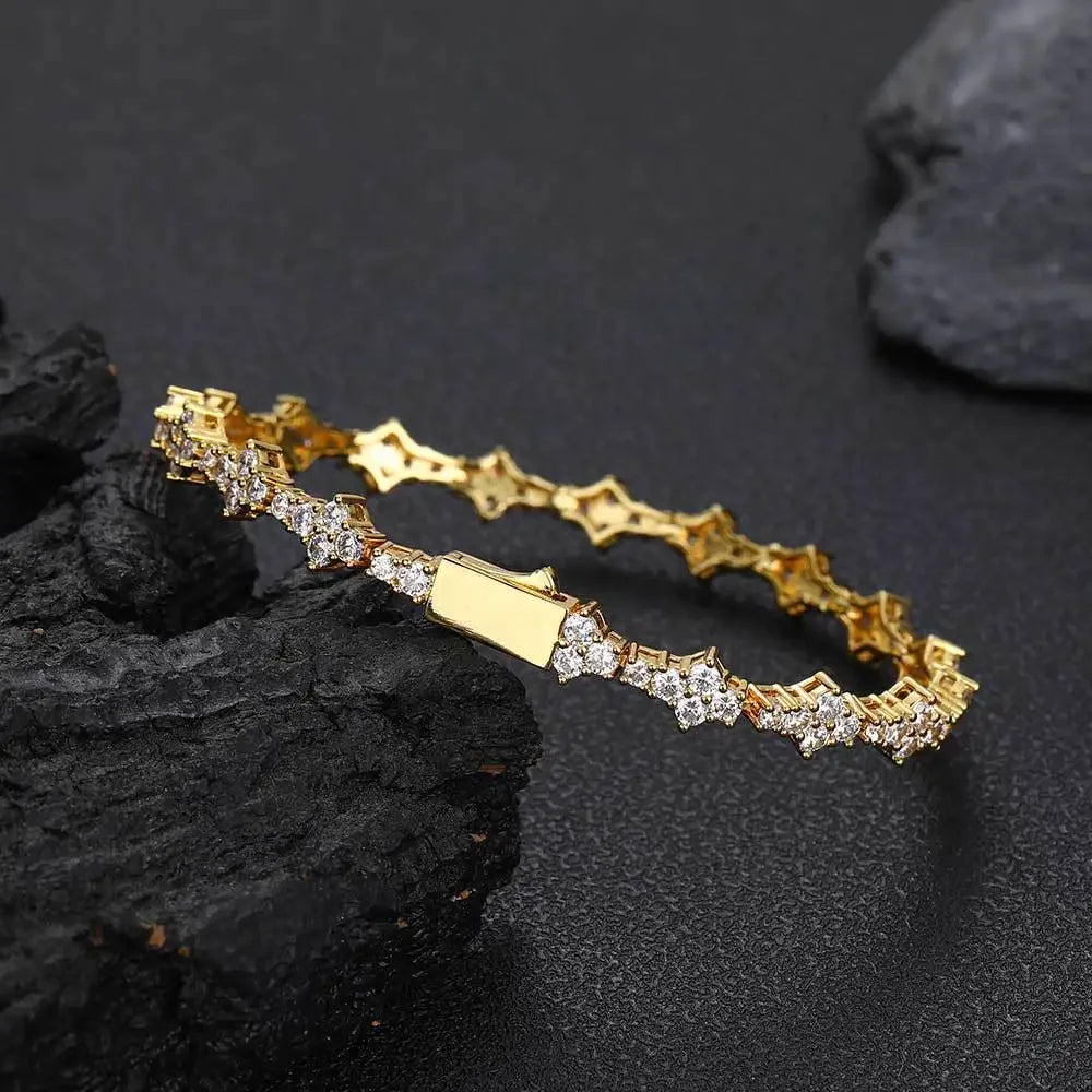 Gold diamond bracelet by Rovelli on black textured background