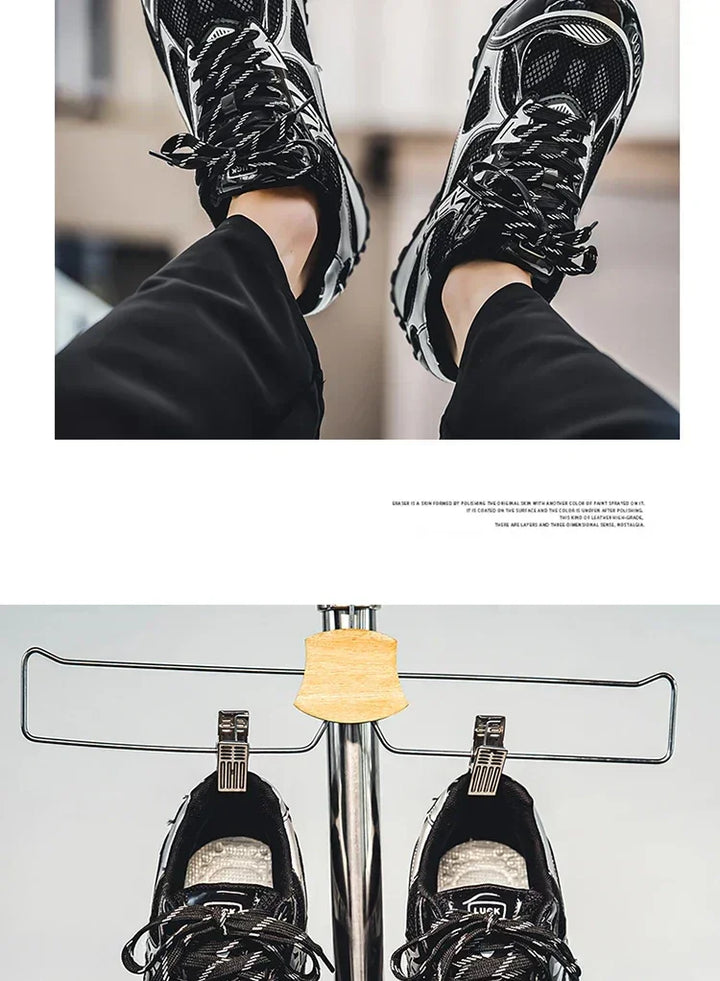 A person wearing black and white sneakers with a cushioned insole and black pants rests their feet on a metal footrest with two clips, viewed from above and from the front.