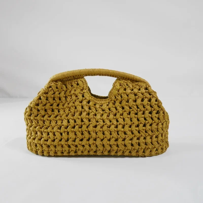 Rovelli yellow woven handbag with top handle on plain background