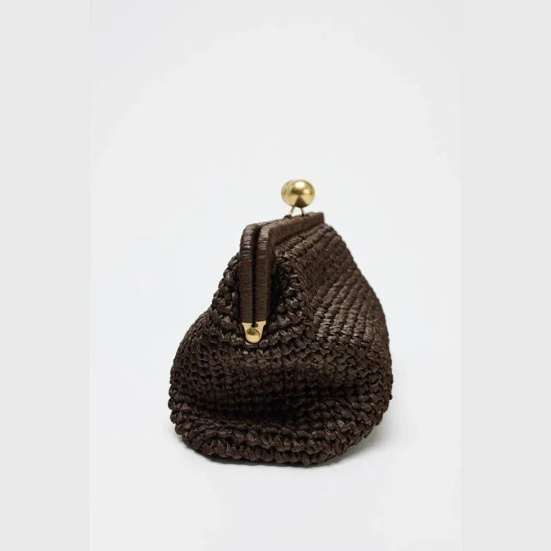 Rovelli dark brown woven clutch with gold clasp on white background