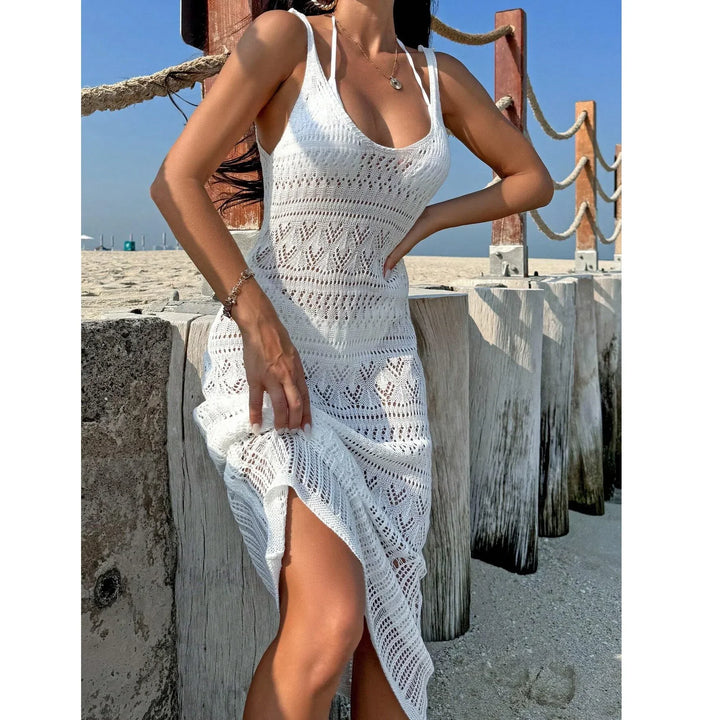 Woman at beach in white crochet dress, seaside fashion by Rovelli