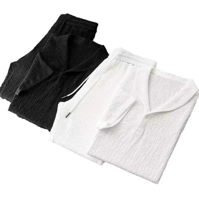 Rovelli textured black and white shirt and pants loungewear sets neatly folded
