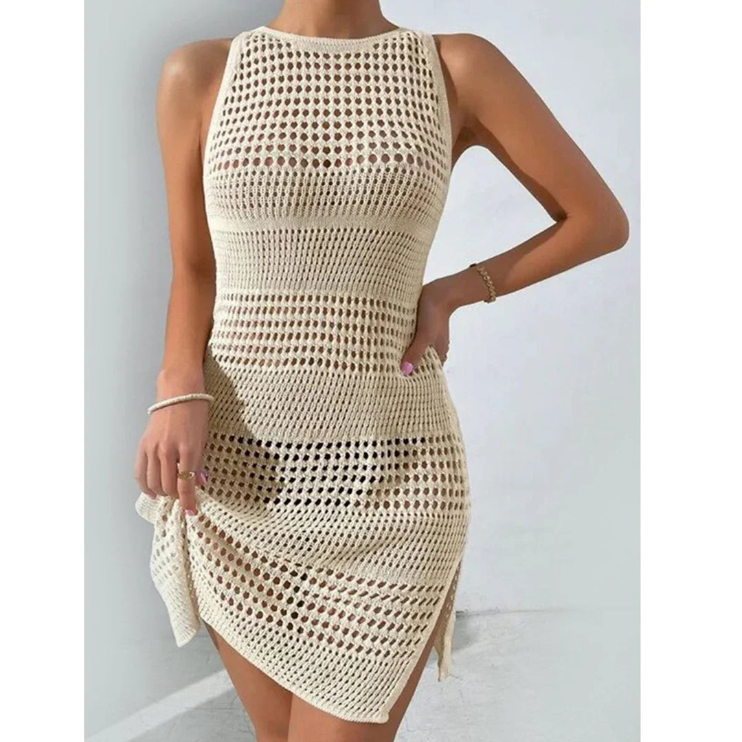 Sleeveless beige crochet mini dress with open knit pattern, summer fashion by Rovelli