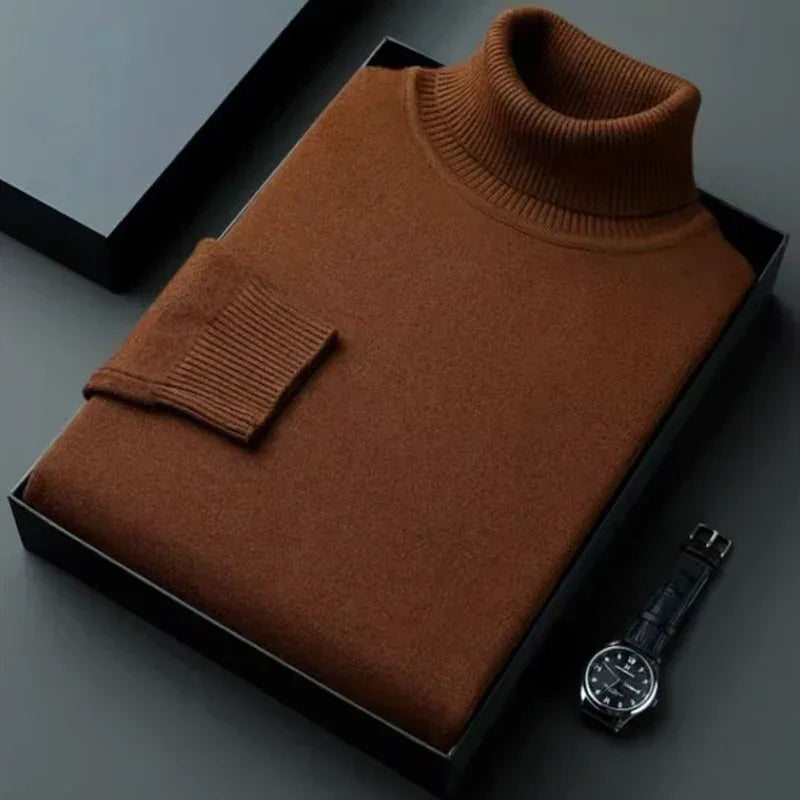 Rovelli brown turtleneck sweater neatly folded in a gift box with a wristwatch beside it