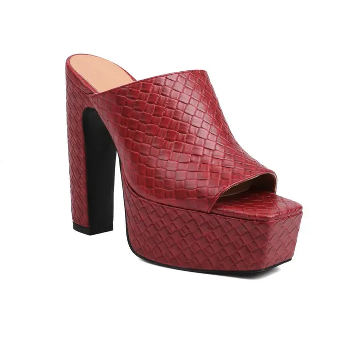 Rovelli red textured platform mule with high block heel and open toe on white background