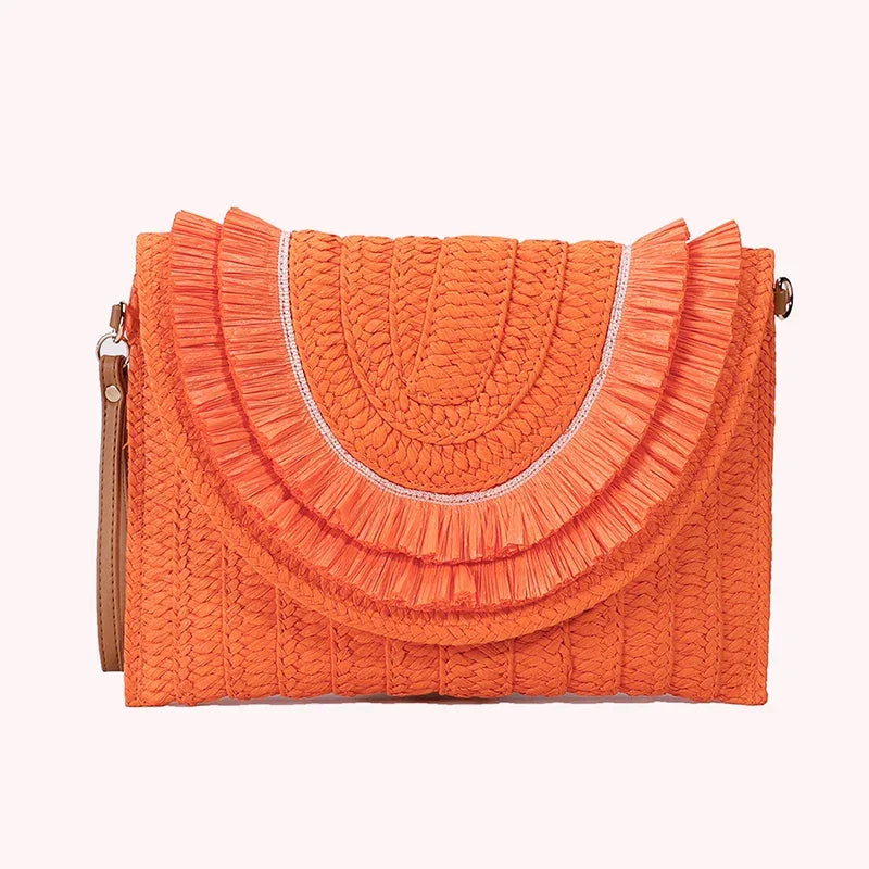 Rovelli orange woven clutch bag with textured flap and wrist strap, front view