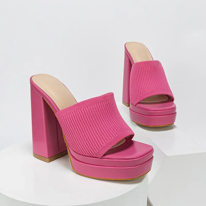 Rovelli pink chunky heeled platform mules with ribbed knit upper on white background