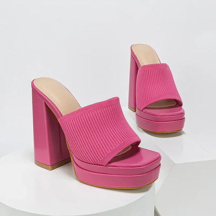 Rovelli pink chunky heeled platform mules with ribbed knit upper on white background