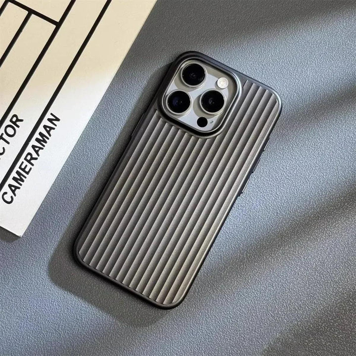 Rovelli ribbed metallic phone case on a textured gray surface