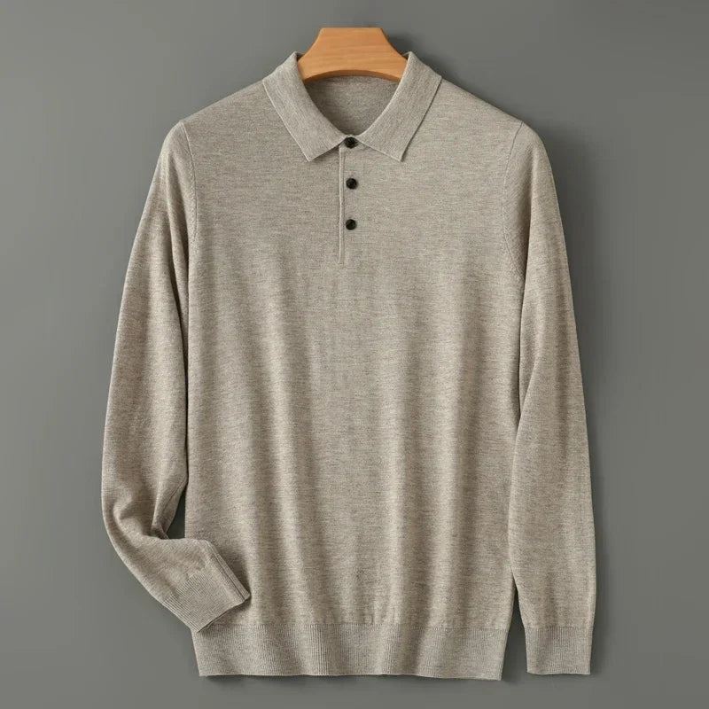 Rovelli light grey long sleeve knit polo shirt on wooden hanger against grey background