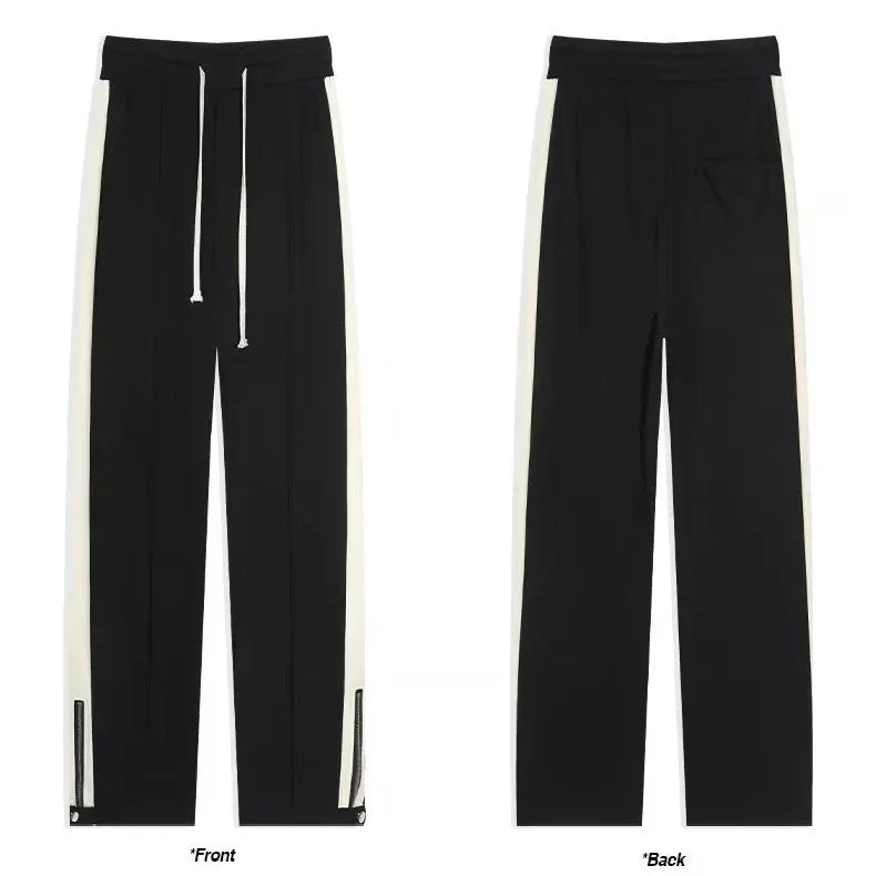 Rovelli black track pants with white side stripes, drawstring waist, front and back view