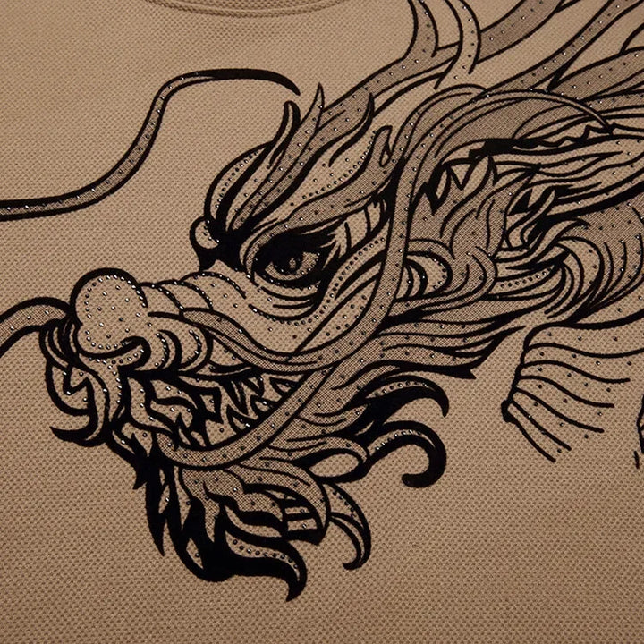 A detailed black line drawing of a dragons head is printed on beige fabric in an Asian art style, featured on an ultra-soft cotton crewneck for men, perfect for celebrating the Year of the Dragon.