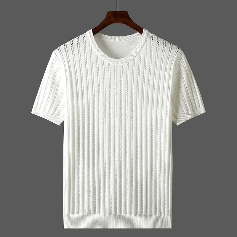 A white short-sleeve knit sweater with vertical ribbed detailing and classic fit, displayed on a wooden hanger against a solid gray background.