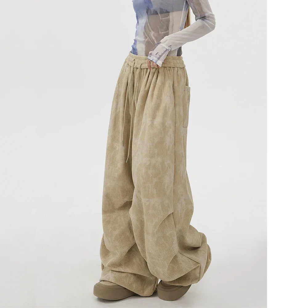 Rovelli wide-leg beige corduroy pants with drawstring waist and side pockets, fashion model