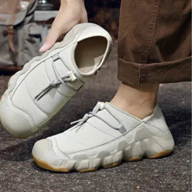 Rovelli light grey slip-on sneakers with thick sole, outdoor ground background