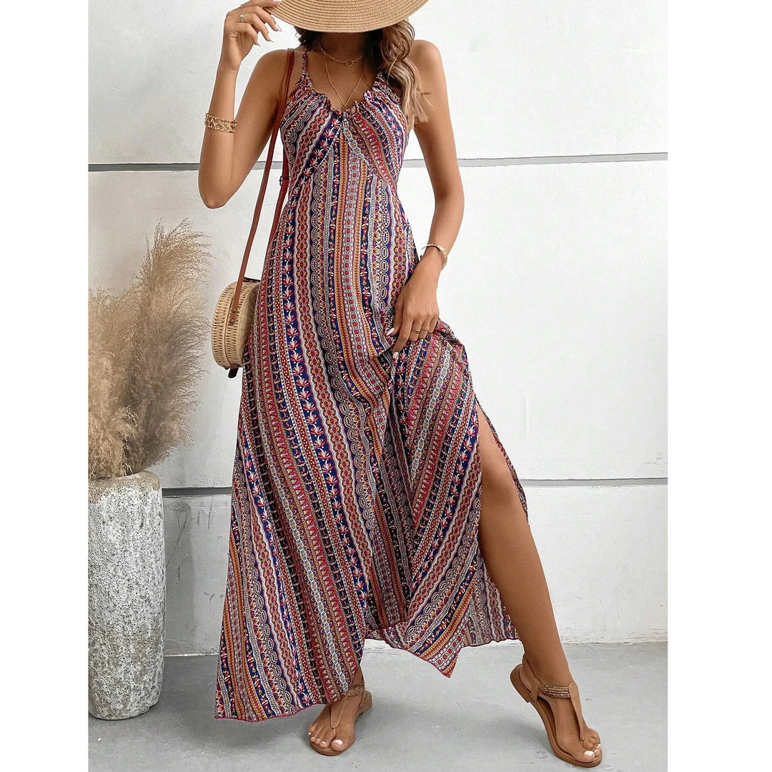 Woman wearing a patterned maxi dress and sunhat, summer fashion by Rovelli