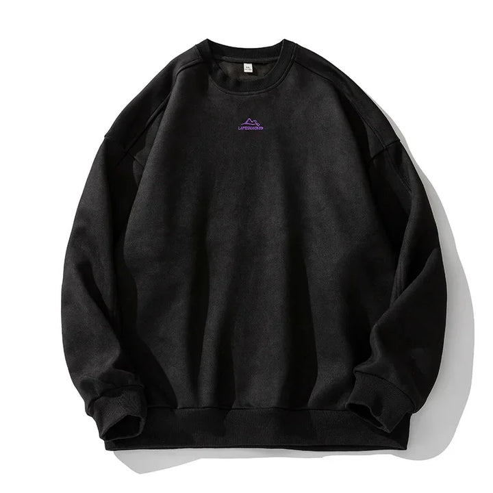Rovelli black crewneck sweatshirt with small purple mountain logo on chest