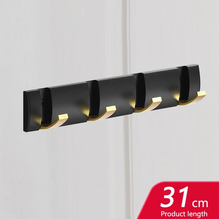 Rovelli black and gold wall hook rack, 31cm length, mounted on white wall