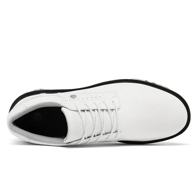 A top view of a white lace-up shoe with a black sole, featuring a smooth upper design, minimal stitching details, and a high-traction outsole for superior grip.