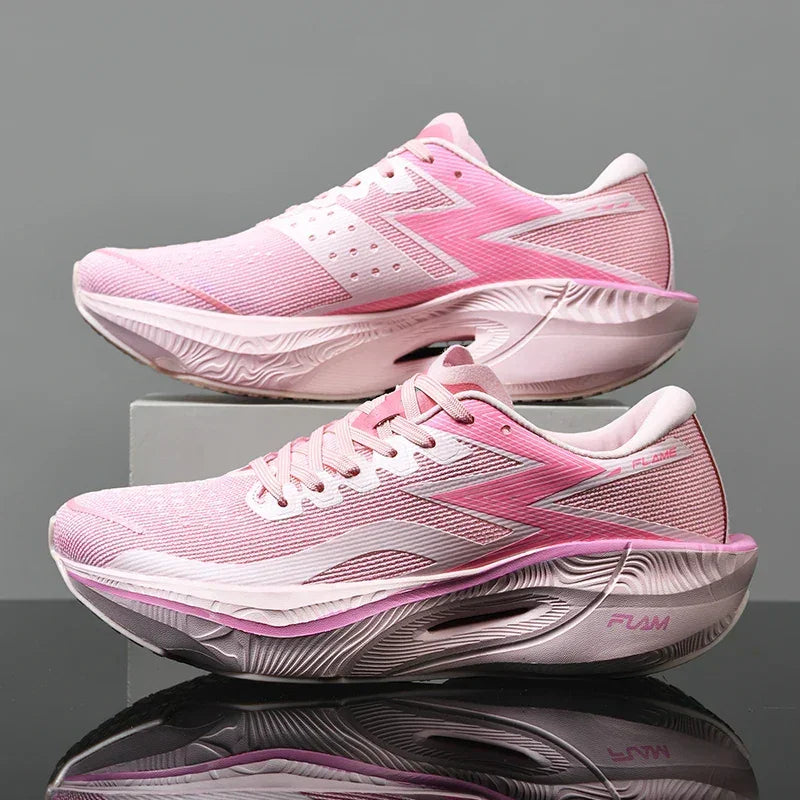 A pair of pink athletic running shoes with white soles and light pink laces, displayed against a gray background. The ultra-lightweight shoes feature gradient pink detailing, aerodynamic design lines, and a shock-absorbing sole for added comfort.