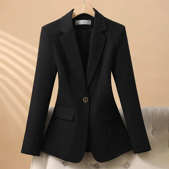 Rovelli tailored black blazer with single button, displayed on hanger against neutral background