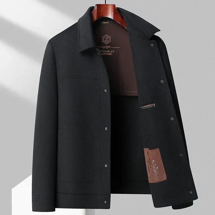 Rovelli black wool coat with front pockets and open collar, displayed on hanger