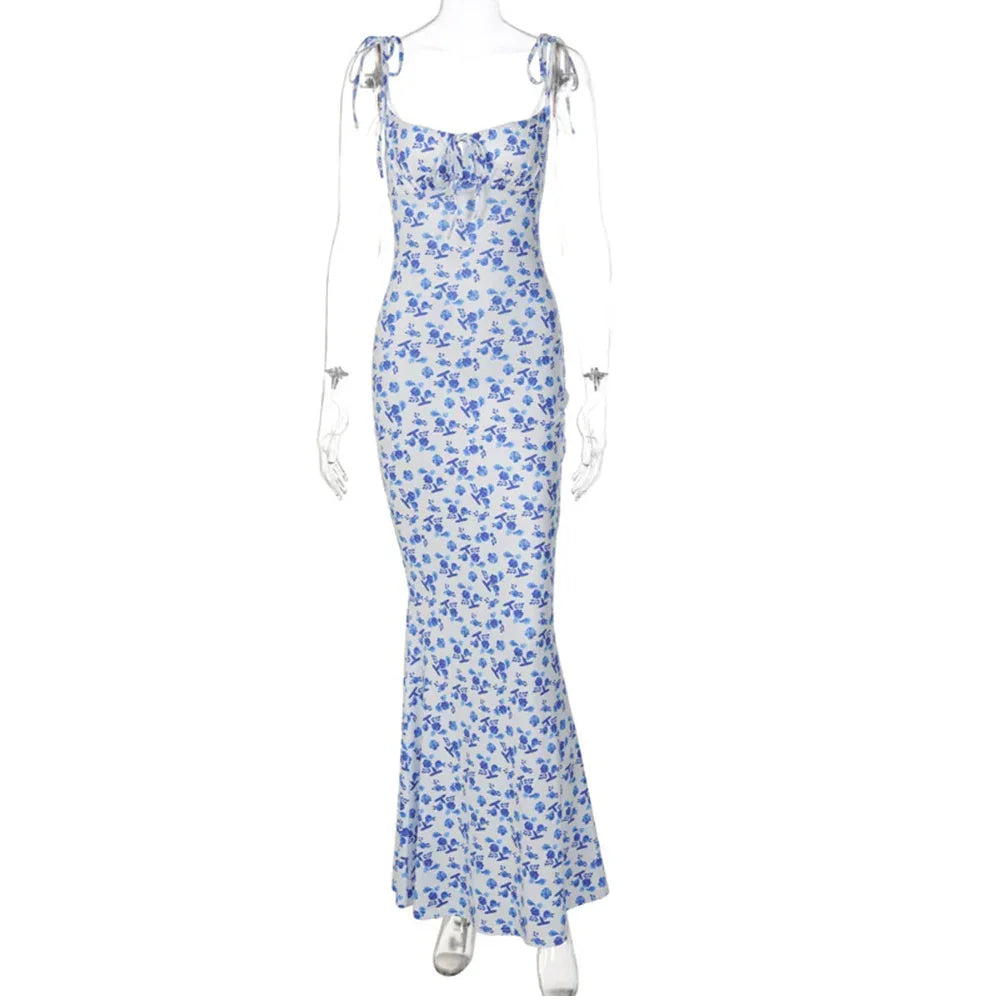 Rovelli blue floral print sleeveless maxi dress with tie straps on mannequin