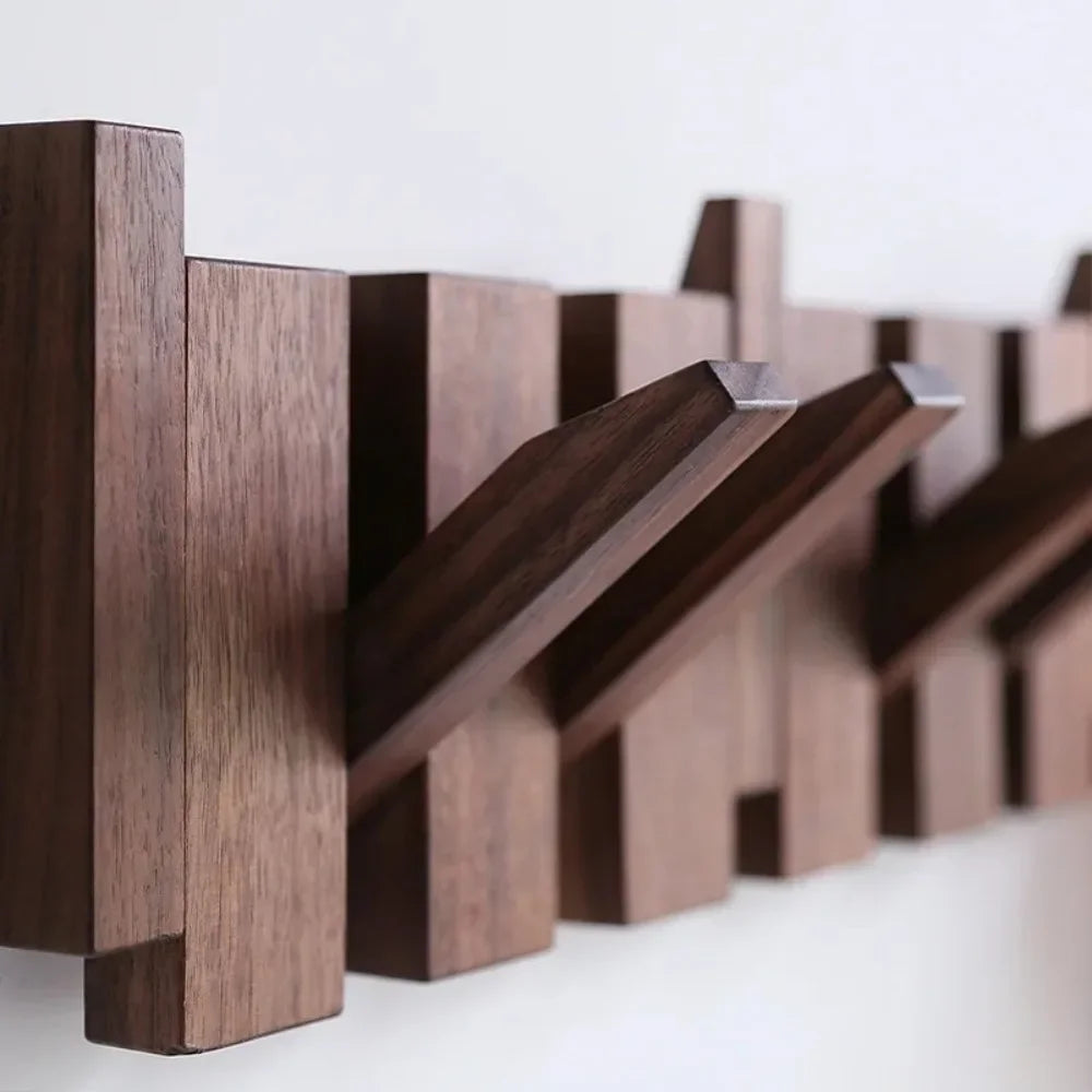 Rovelli modern wooden wall-mounted coat rack with angled hooks on a white background