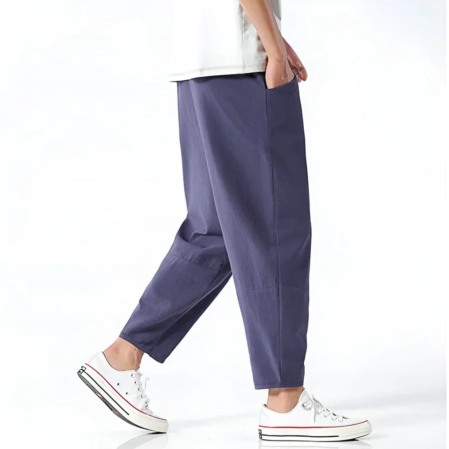 Rovelli loose fit blue cropped pants with pockets, styled with white sneakers