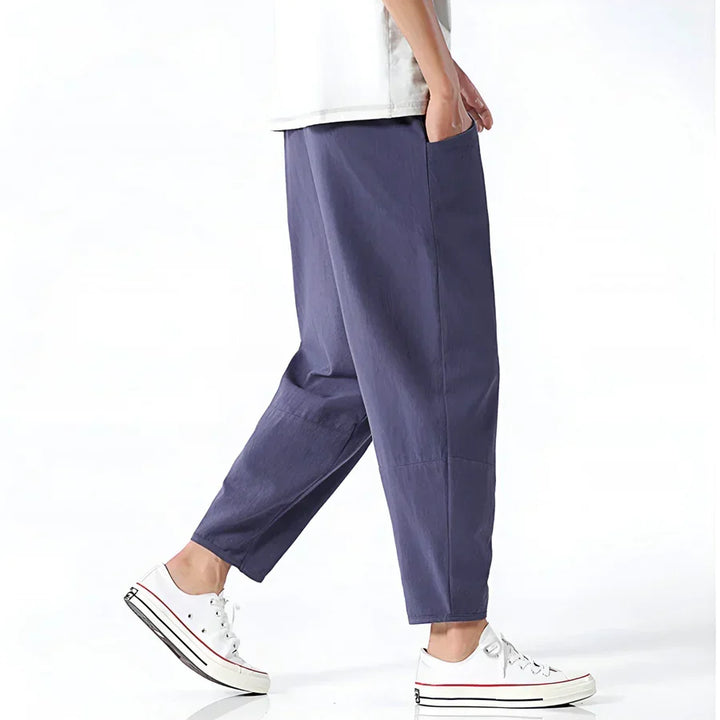 Rovelli loose fit blue cropped pants with pockets, styled with white sneakers