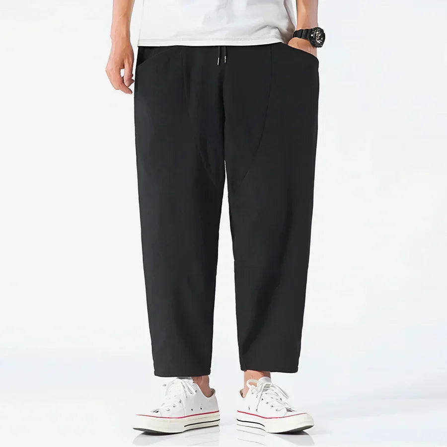 Rovelli casual black cropped pants with drawstring waist, styled with white sneakers