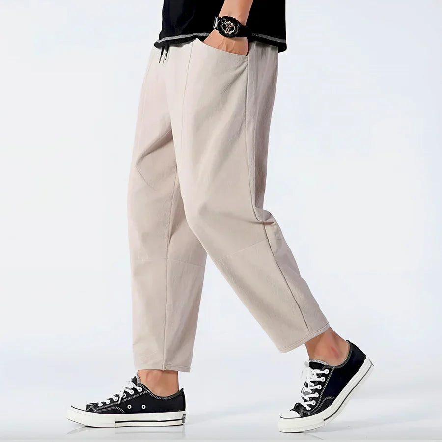 Rovelli casual beige pants with pockets, styled with black sneakers and a black top