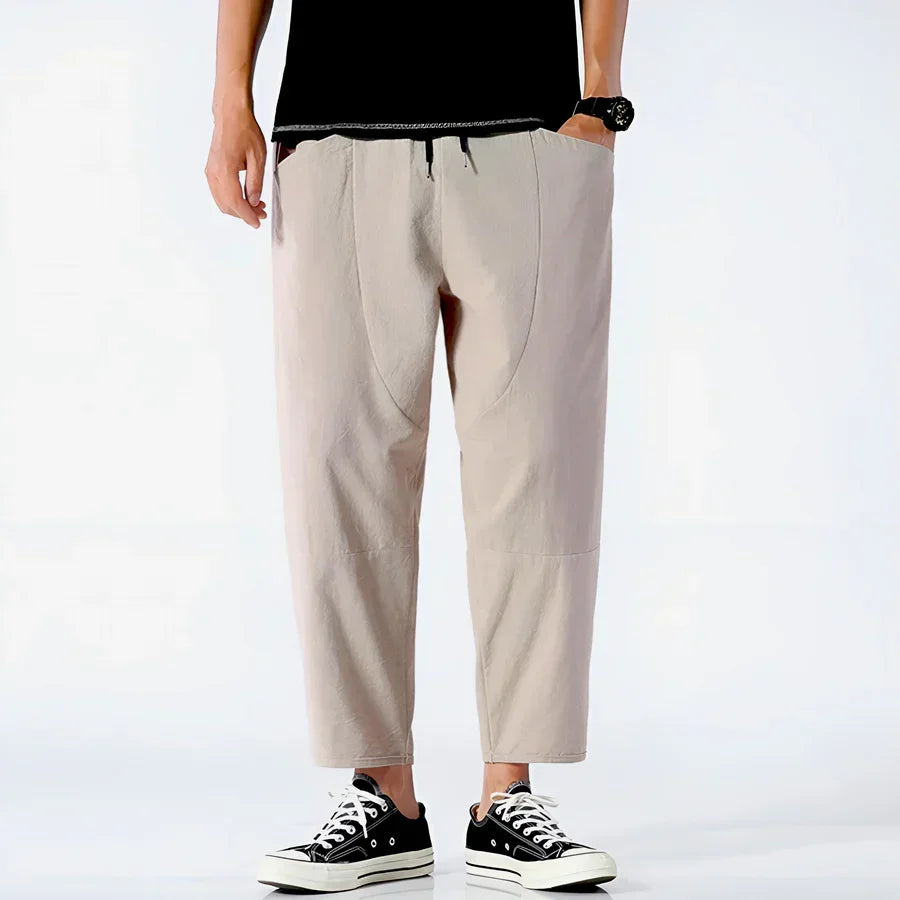 Men's beige drawstring pants with pockets, casual streetwear from Rovelli