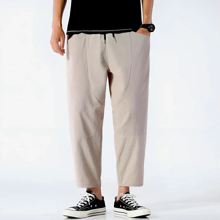 Men's beige drawstring pants with pockets, casual streetwear from Rovelli