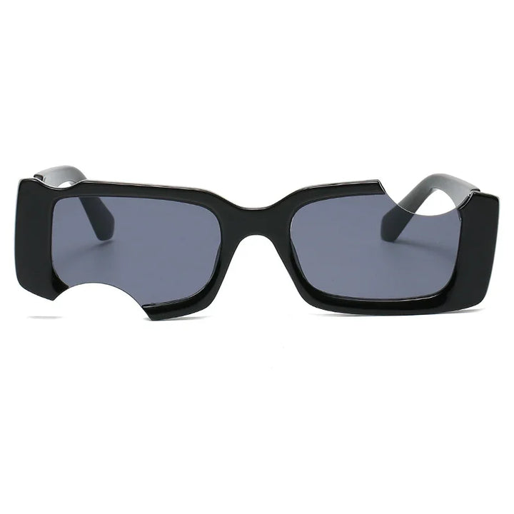 A pair of rectangular black sunglasses with dark lenses, featuring a distinctive cut-out notch on the lower left side of the frame—perfect for elevating your street style with bold geometric frames.