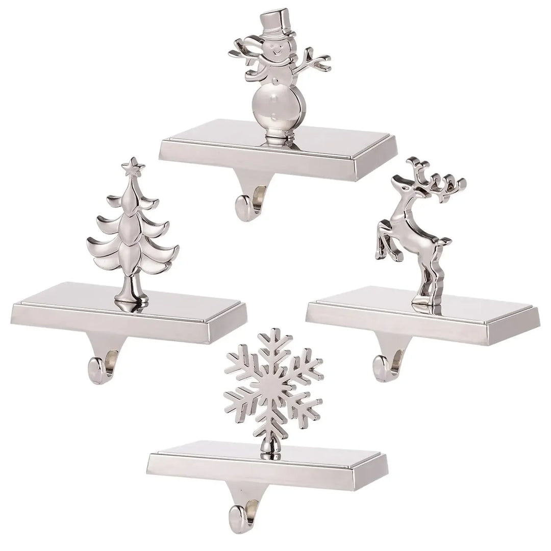 Rovelli silver holiday stocking holders with snowman, reindeer, tree, and snowflake designs