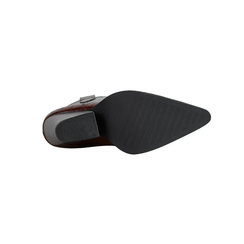 Rovelli brown dress shoe with pointed black sole and textured heel, viewed from below