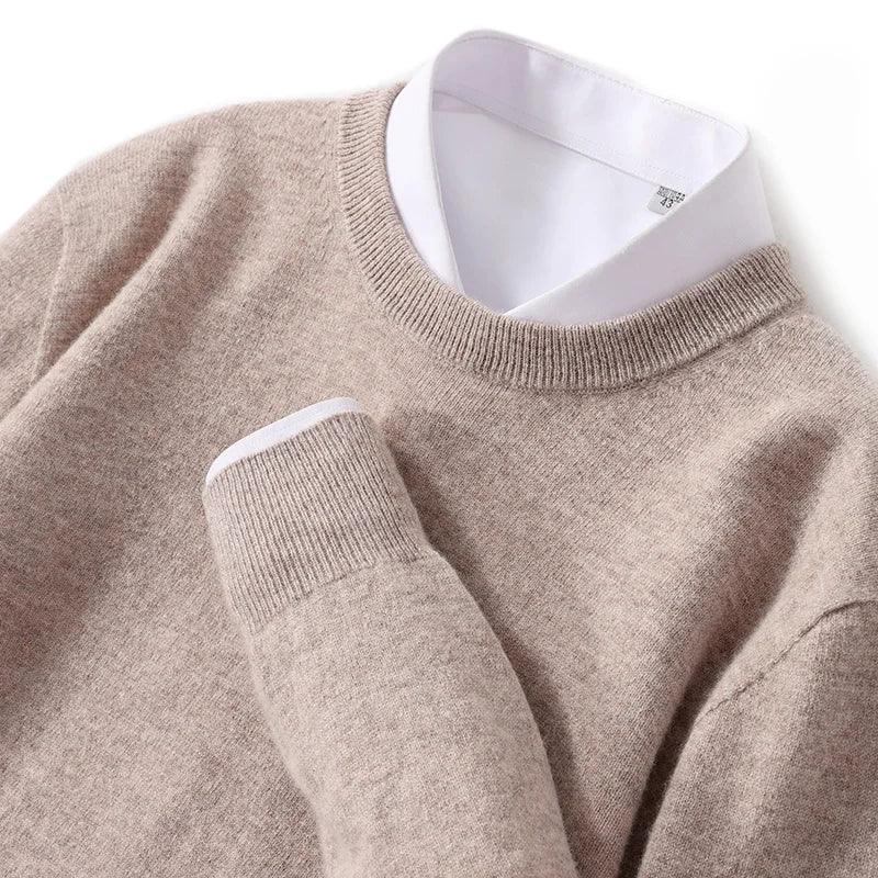 Beige knit sweater layered over white collared shirt, Rovelli classic style apparel