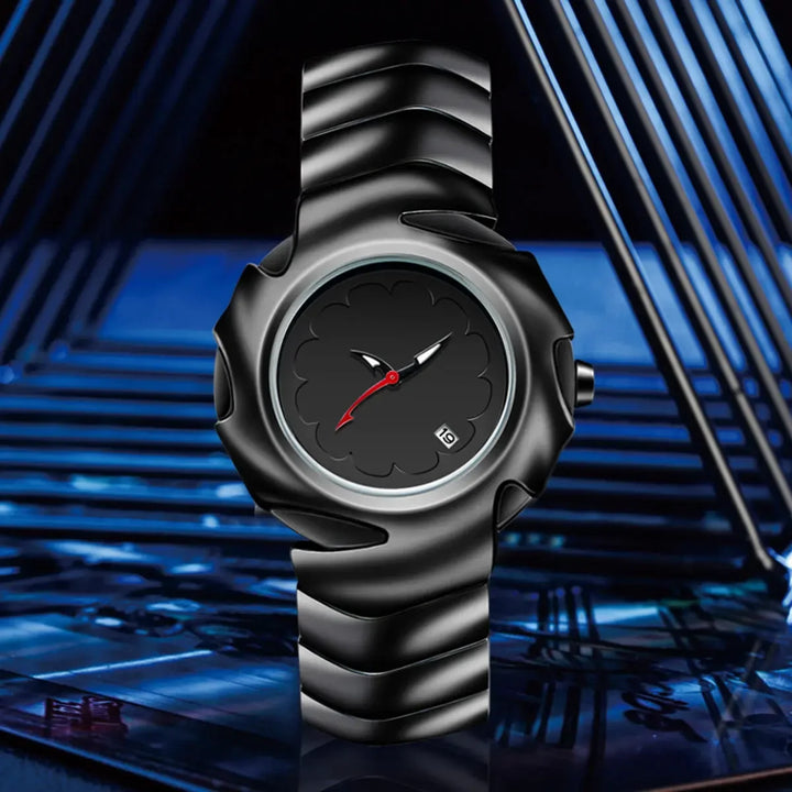 A black, scratch-resistant wristwatch with a wavy textured band and case is displayed against a geometric blue and black background. The minimalist watch face features red and white hands along with a small date window.