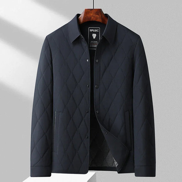 Rovelli black quilted jacket with collar, diamond pattern, front buttons, on hanger