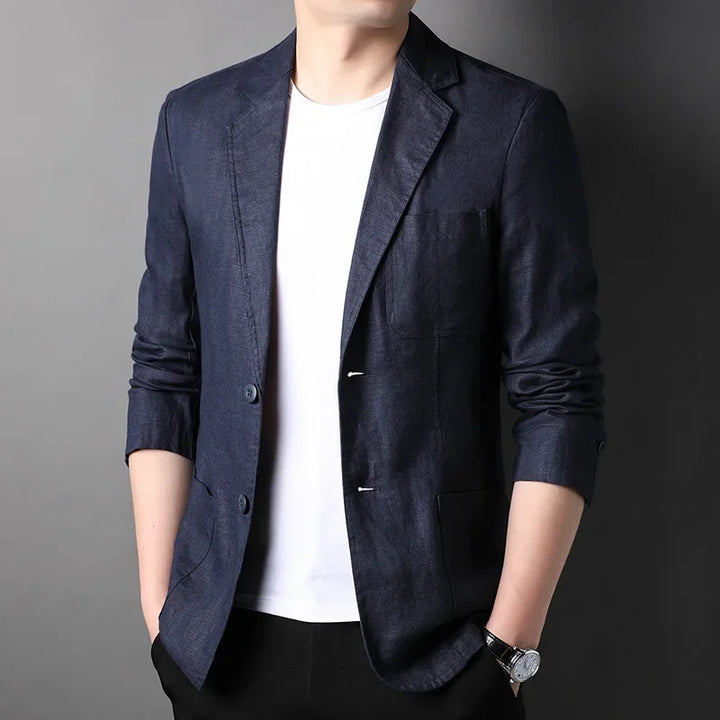 Man wearing navy blue blazer and white t-shirt from Rovelli, modern casual style