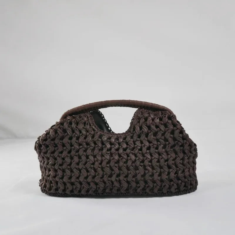 Rovelli dark brown woven handbag with cutout handle on white background