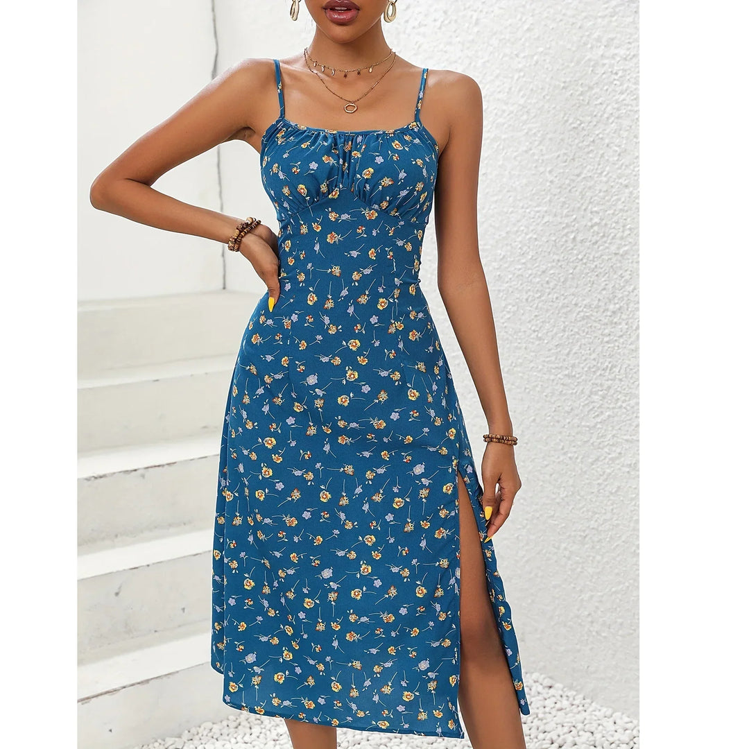 Woman wearing blue floral sundress with slit, Rovelli fashion summer dress