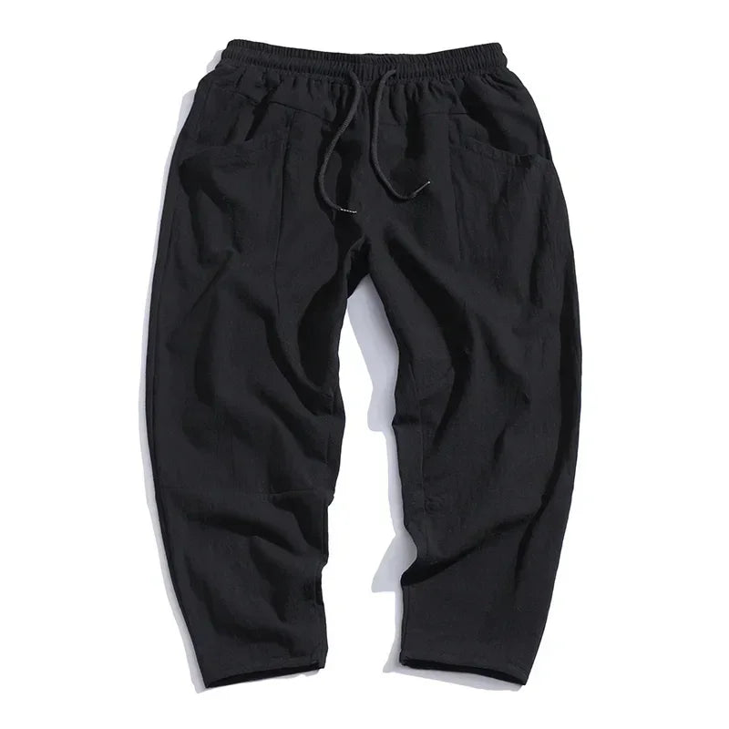 Black casual jogger pants with elastic waistband and drawstring, Rovelli fashion