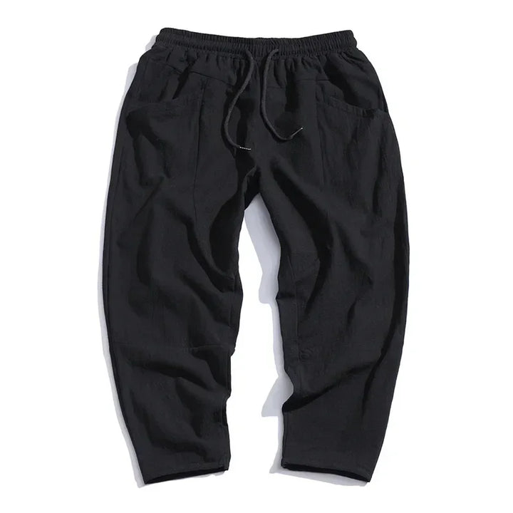 Black casual jogger pants with elastic waistband and drawstring, Rovelli fashion