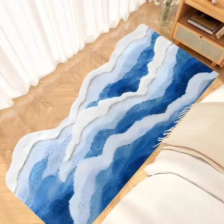 Blue and white abstract area rug in modern living room with wooden floor, Rovelli home decor