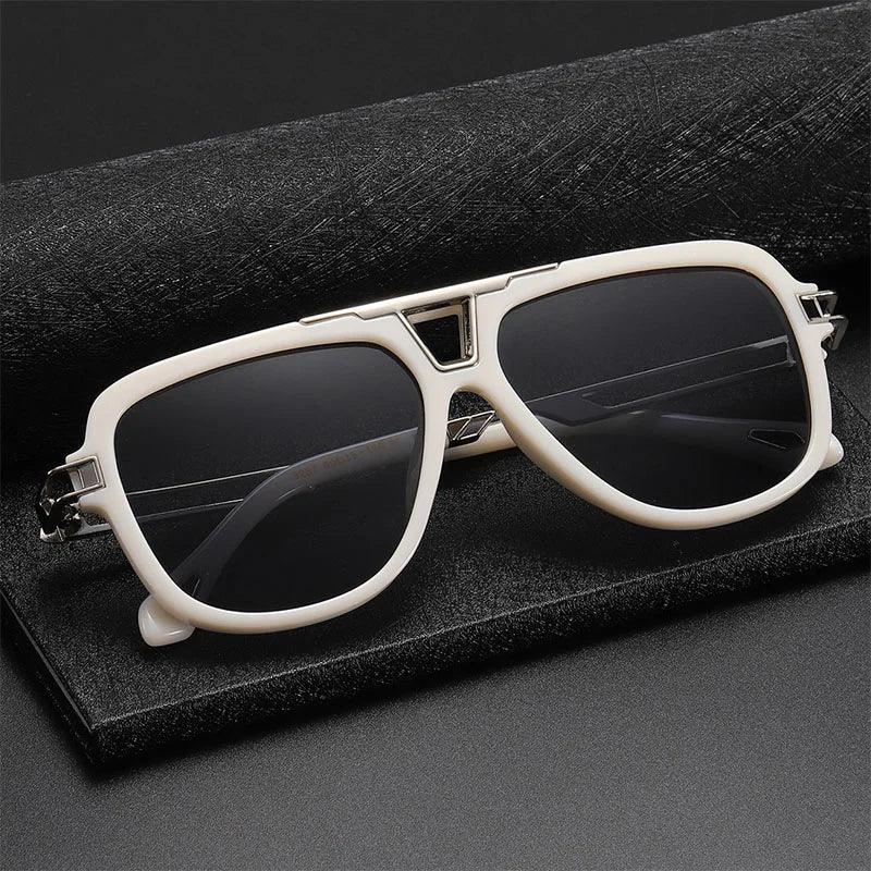 White-framed vintage sunglasses with dark lenses rest on a black textured case against a dark background, exuding classic aviator style and timeless appeal.